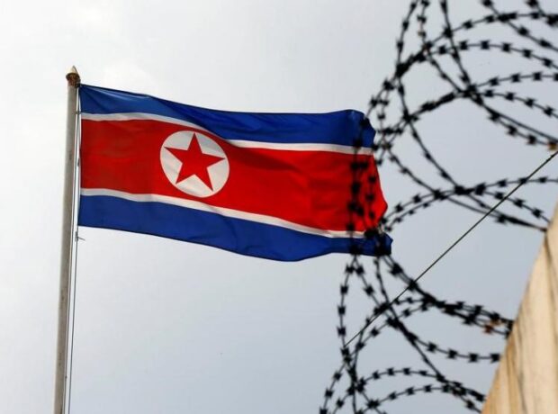 image-file-photo-the-north-korea-flag-flutters-next-to-concertina-wire-at-the-north-korean-embassy-in-kuala-lumpur