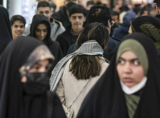 image-a-woman-sans-head-covering-at-the-tajrish-bazaar-in-tehran-jan-28-2023-arash-khamooshi-the-new-york-times